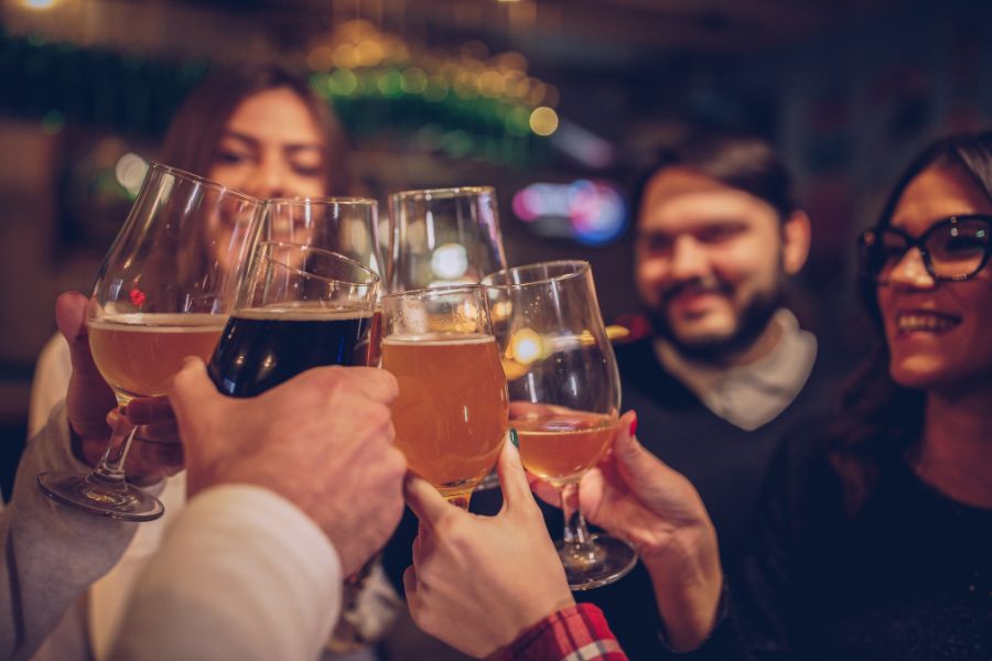 A group of friends drinking at a bar