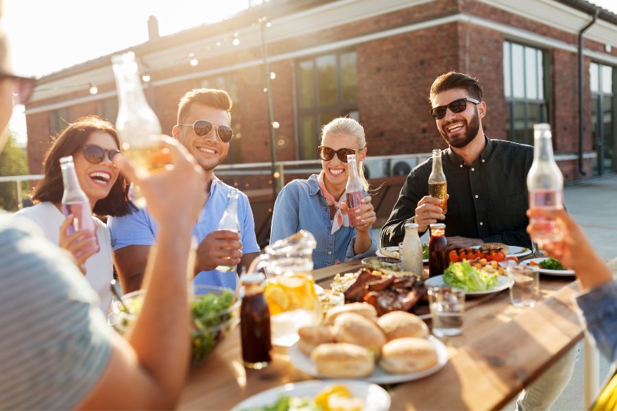 a group of friends drinking outside