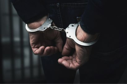 sex-crimes handcuffed hands behind a back